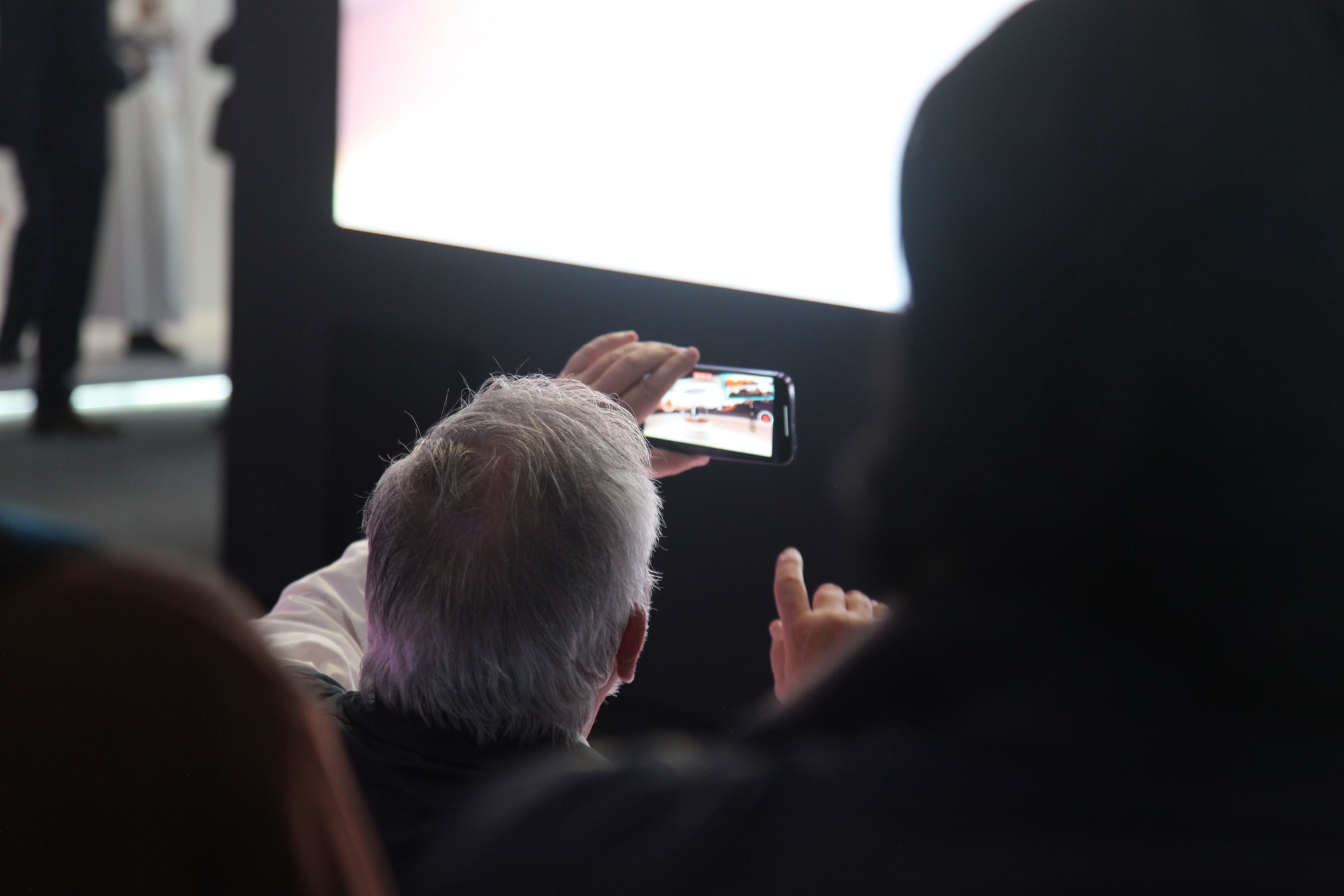 Audience member recording the live TONOMUS virtual worlds performance